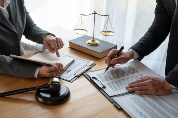 Lawyer Legal Advisor Businessman Brainstorming Information On Agreement Details