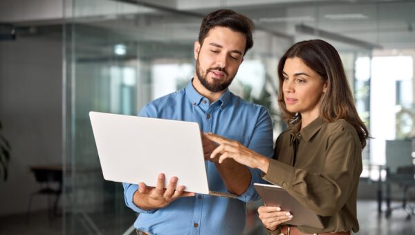 Two Busy Professional Business People Working In Office With Computer.