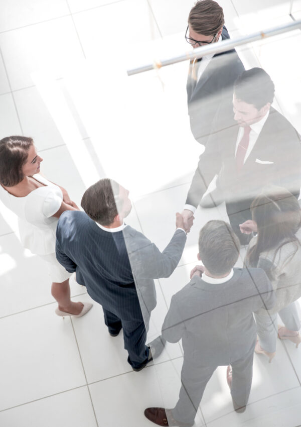 Business Background.handshake Business Men In The Business Center