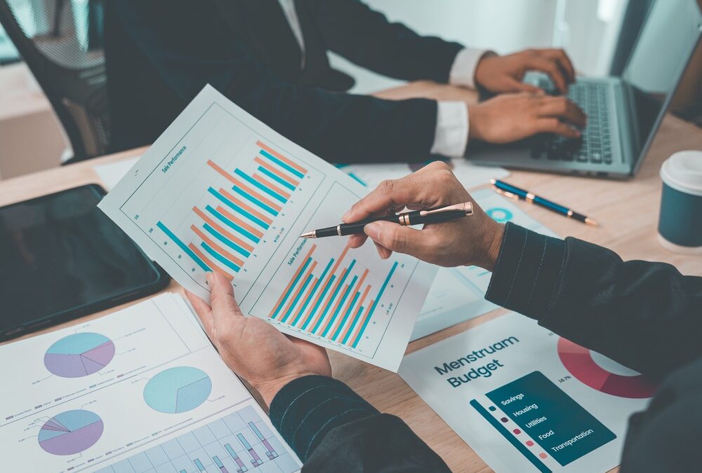 In The Workplace Business Teams Analyze Financial Data